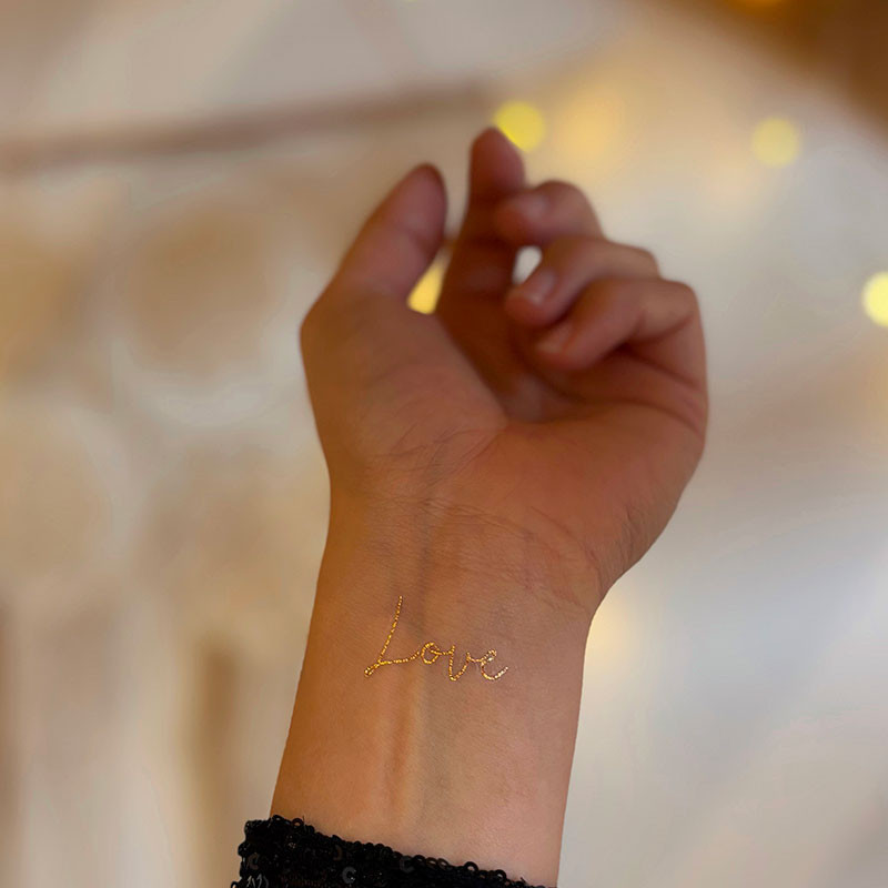 Tatouage temporaire Love doré