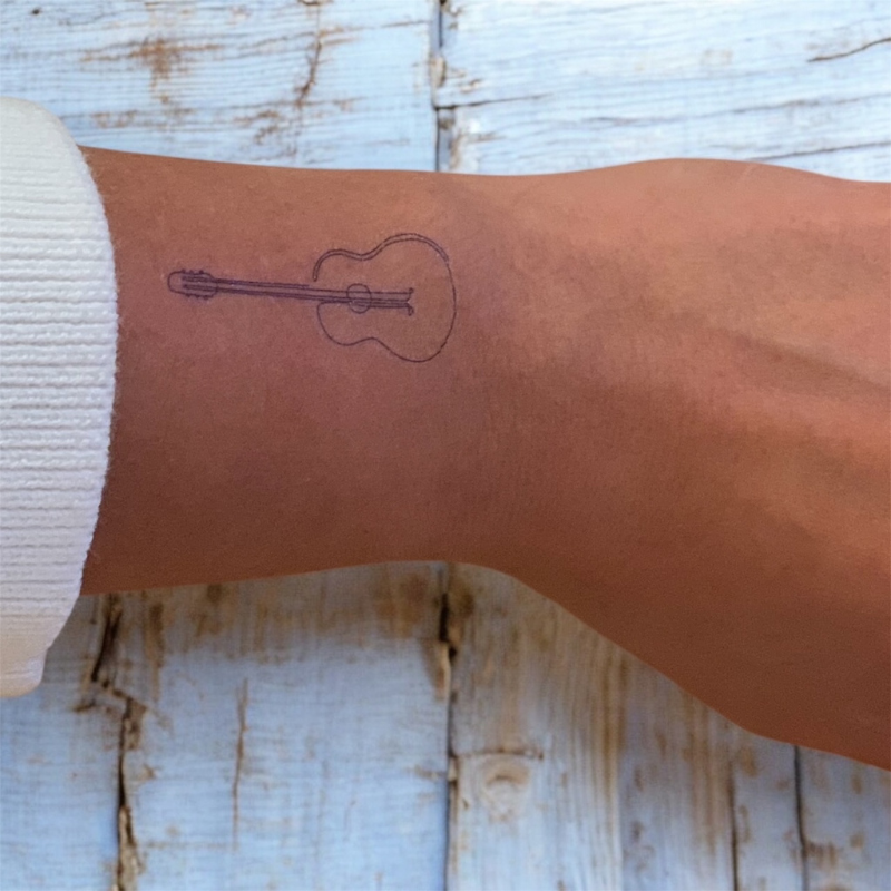 Find the temporary Guitar tattoo created by Audrey Suau