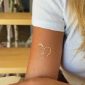 Sioou Golden heart tattoo